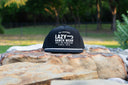 Lazy J Ranch Black Untroubled Classic Rope Trucker Hat-