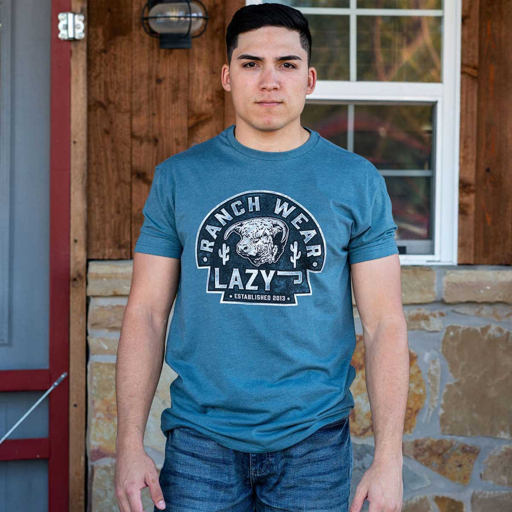 
                      
                        Lazy J Ranch Cactus Hereford Arrowhead Short Sleeve Slate Blue T-Shirt
                      
                    